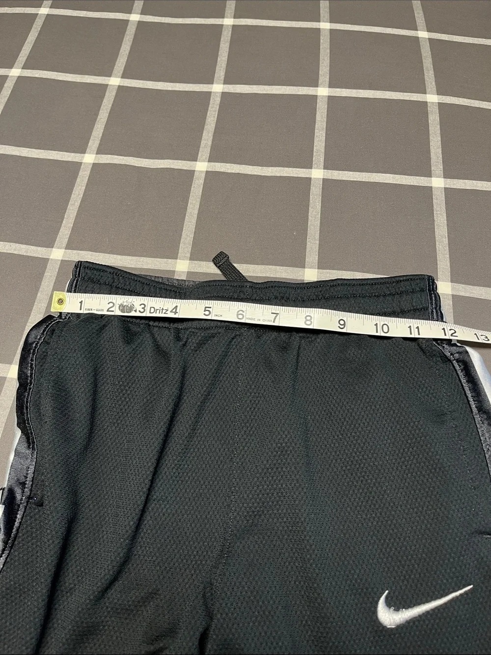 Nike Black Athletic Basketball Shorts with White Swoosh